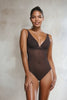 Video of a model wearing an Ender Legard JONI backless bodysuit in colour brown as seen from a front view